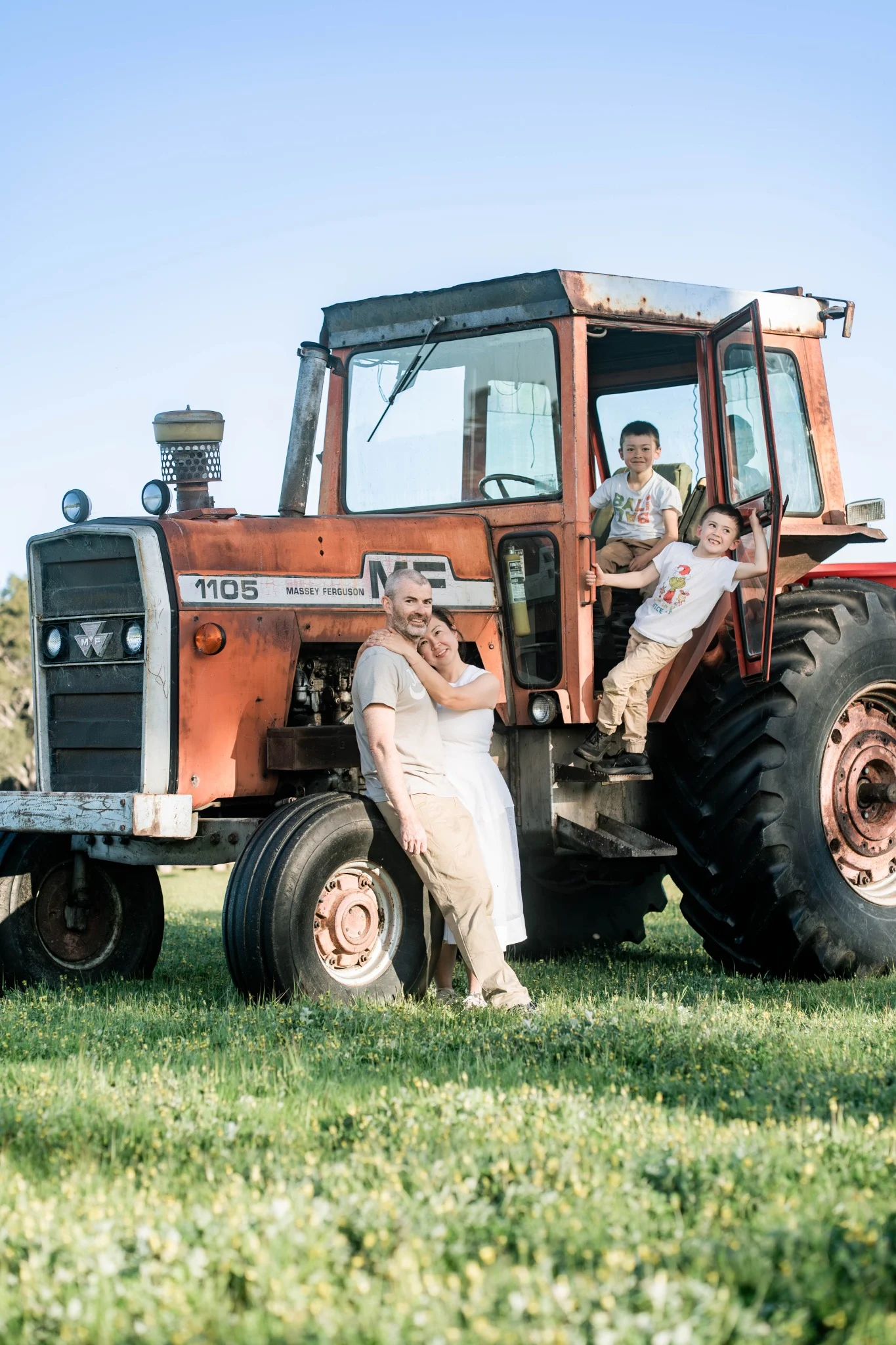 Tammy's family gathered on a vintage tractor on a farm near Perth, Western Australia